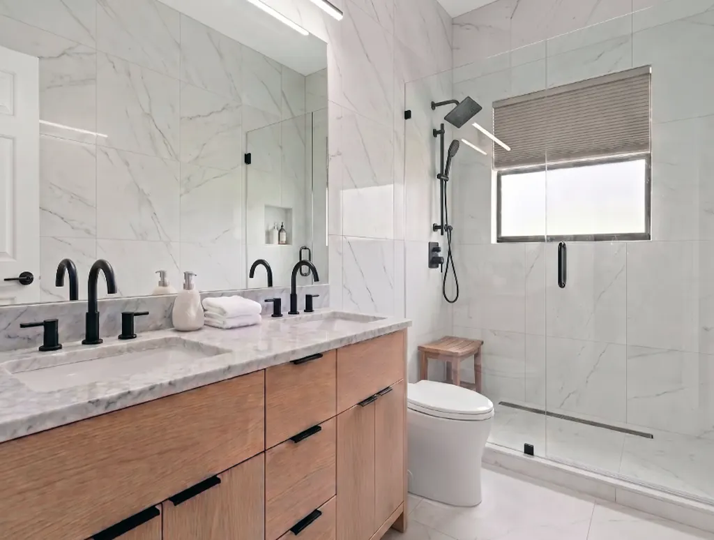 After remodel: luxury curbless shower with linear drain